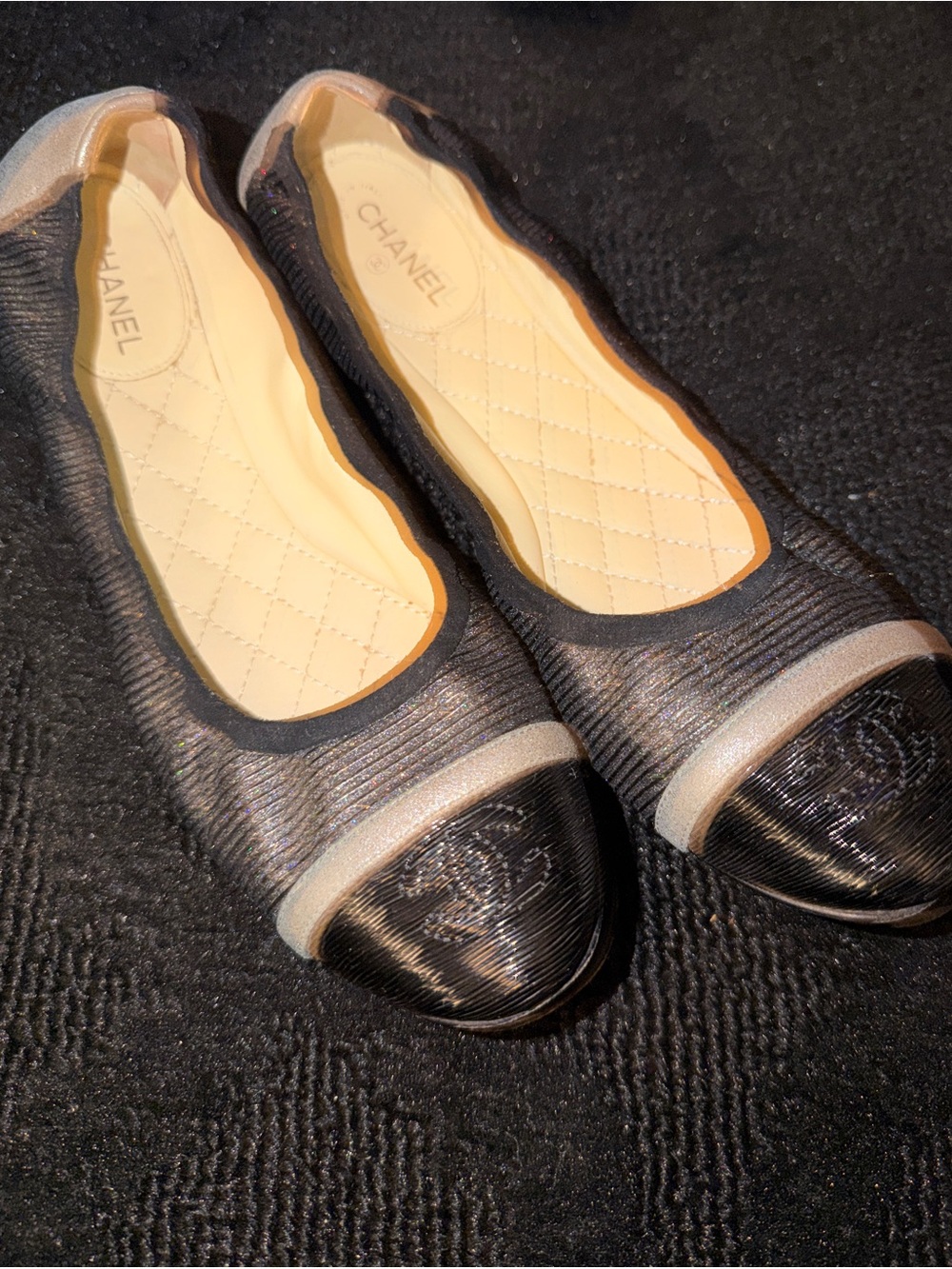 CHANEL Black and Cream Quilted Insole Cap-Toe Ballet Flats
